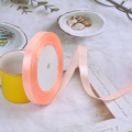 Фото товара - 98907 Лента упаковочная №7 (1см*22м, атласная, персиковая), (Yiwu Huanyun Weaving Belt Co., Ltd)