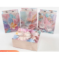 Фото товара - Пакет Бумажный 26*32 Романтика (в ассорт.,блестки) YC139M, (Yiwu Ouwei Paper packaging Co.,Ltd.)