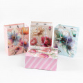 Фото товара - Пакет Бумажный 30*42 Нежность (в ассорт.,блестки) YC336L, (Yiwu Ouwei Paper packaging Co.,Ltd.)